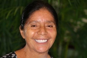 Woman smiling with new dentures