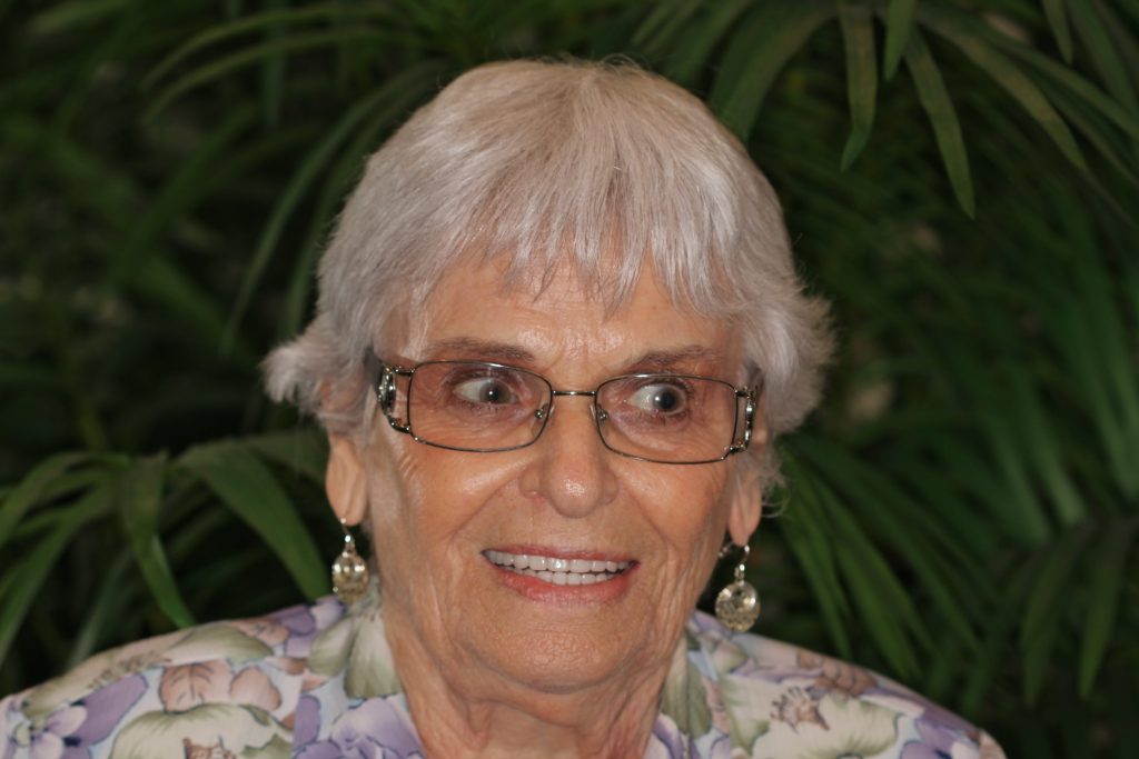 WOMAN SMILING WITH NEW UPPER & LOWER DENTURES