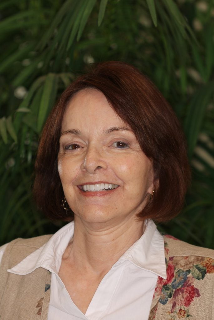 Woman smiling after CEREC Porcelain Veneers